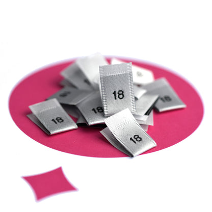 WOVEN SIZE LABEL SIZES 0 - 20 BLACK TEXT ON SATIN WHITE PACK 100