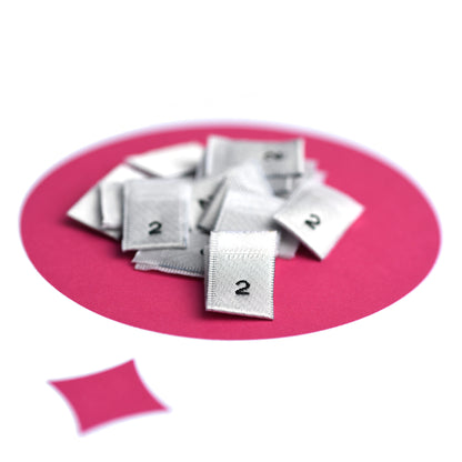 WOVEN SIZE LABEL SIZES 0 - 20 BLACK TEXT ON SATIN WHITE PACK 100
